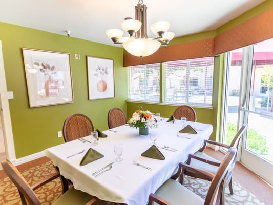 Bright dining room setup with table and decorations