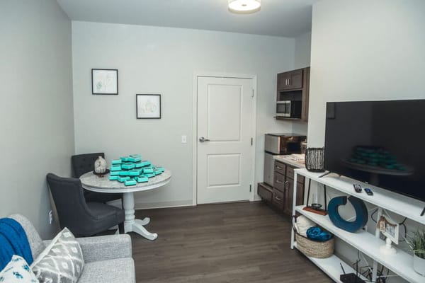 Interior view of a resident room with kitchenette