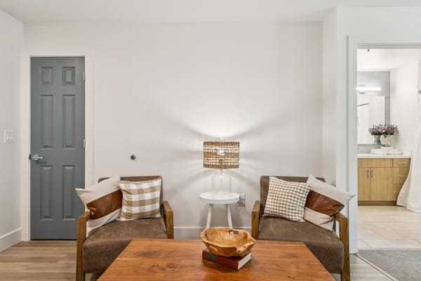 Cozy sitting area in a resident room with a small table