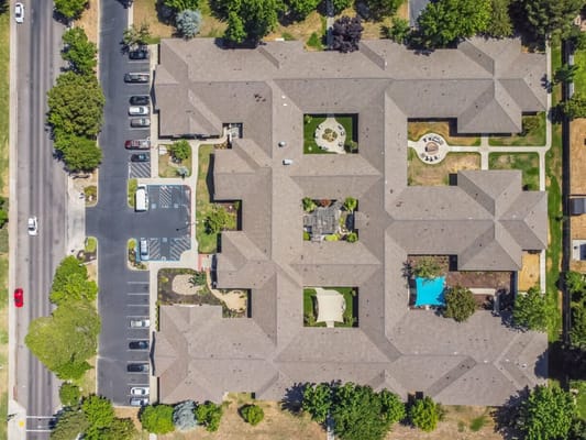 Aerial view of the assisted living facility with outdoor spaces