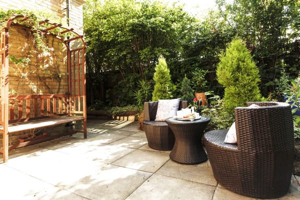 Outdoor seating area with garden plants