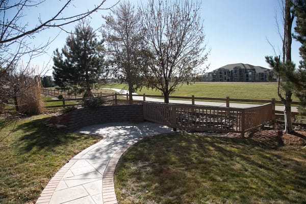 Pathway in a landscaped outdoor area of the facility