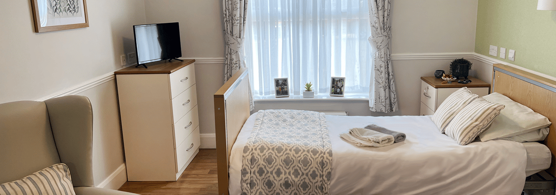 Cozy private resident room with a bed and TV