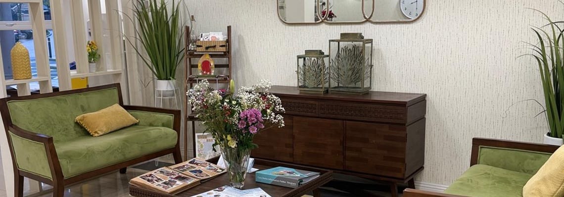 Comfortable seating area with plants and decor