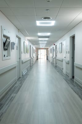 Well-lit hallway in a nursing facility
