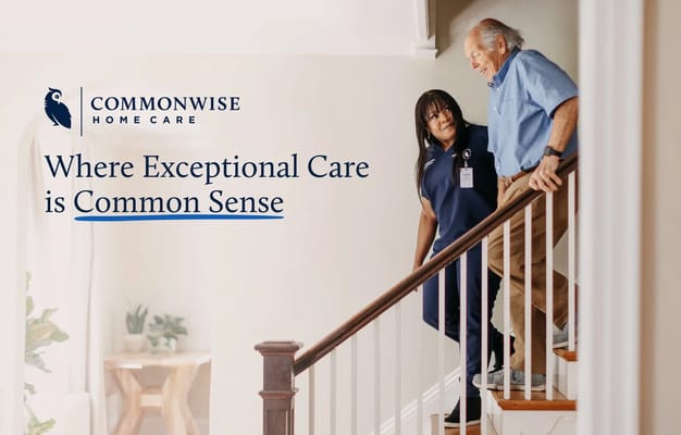 A caregiver assisting an older man on stairs