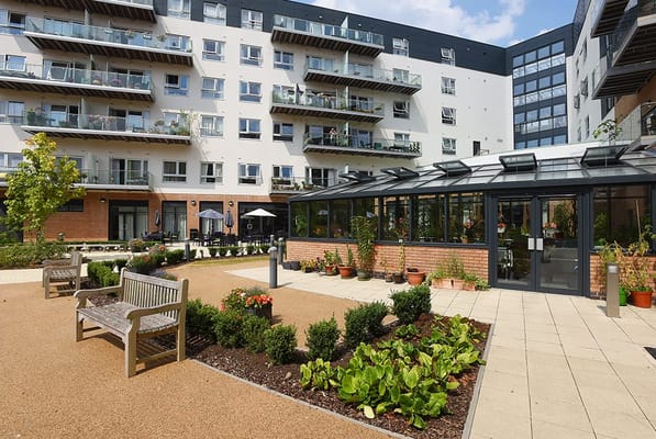Exterior view of the Bournville Gardens Retirement Village and garden area