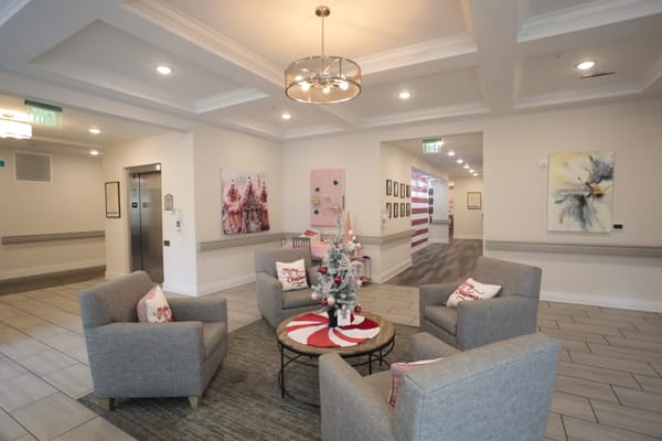 A cozy lobby area with holiday decorations