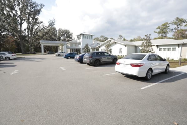 Exterior view of The Canopy at Duval Station with parking lot