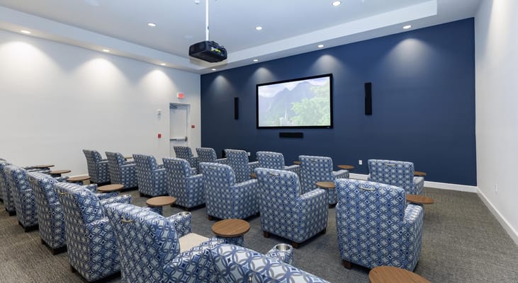 Interior of a media room with comfortable seating