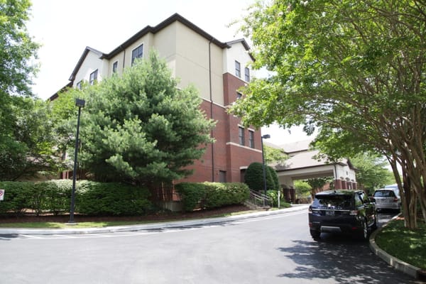 Exterior view of Brookdale Green Hills Cumberland with landscaped grounds