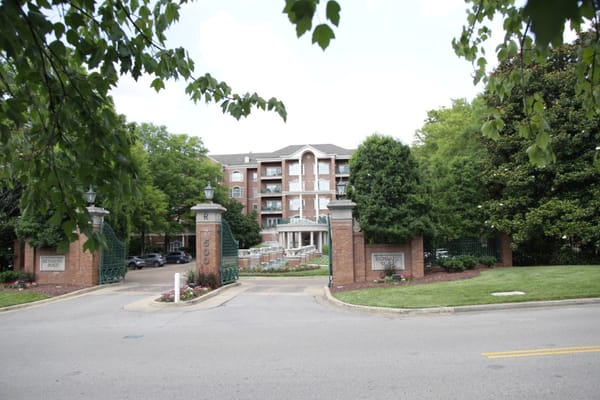 Entrance view of Richland Place with manicured landscape