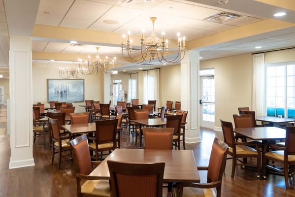 Dining room with tables and chandeliers