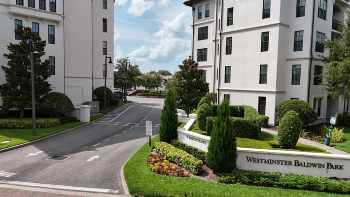 Exterior view of Westminster Baldwin Park with landscaped areas