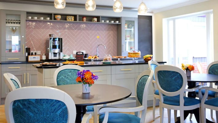 Interior dining area with tables and food displayed