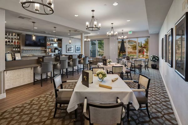 Elegant dining area with tables and chairs