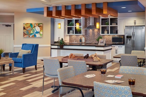 Bright common area with seating and decor