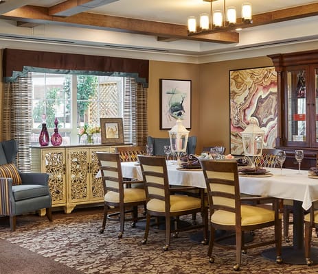 Bright dining room set with tables and decorations