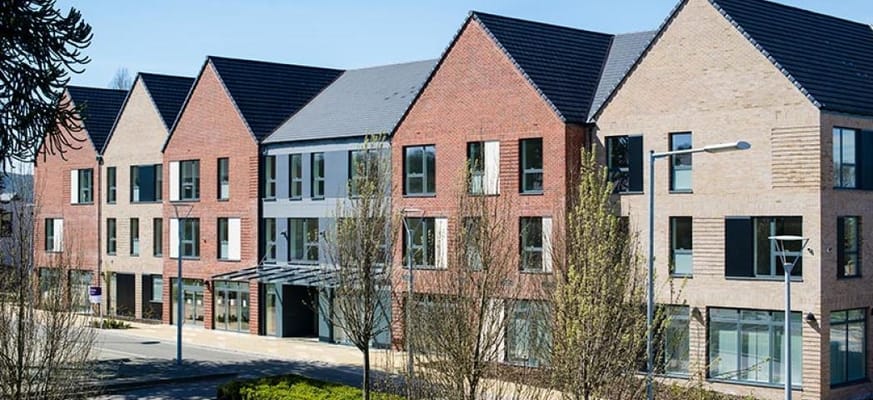 Exterior view of Rose Manor with landscaping