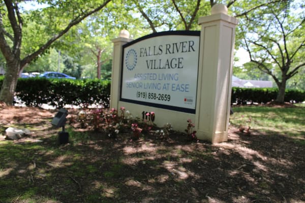 Sign displaying Falls River Village Assisted Living