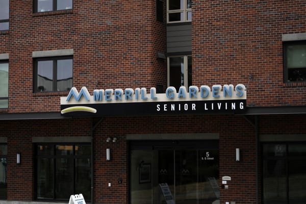 Building facade with facility logo