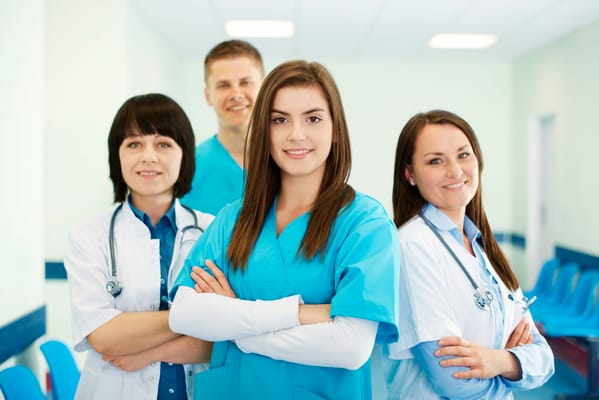 A group of healthcare staff members posing together