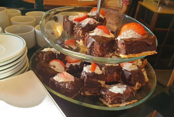 Delicious chocolate dessert with strawberries on top