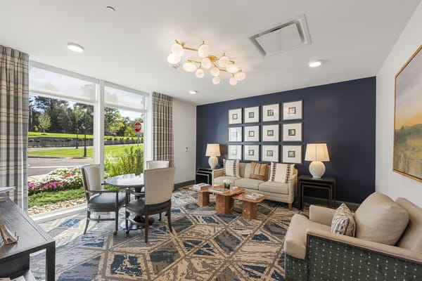 Bright interior common area with seating and decor