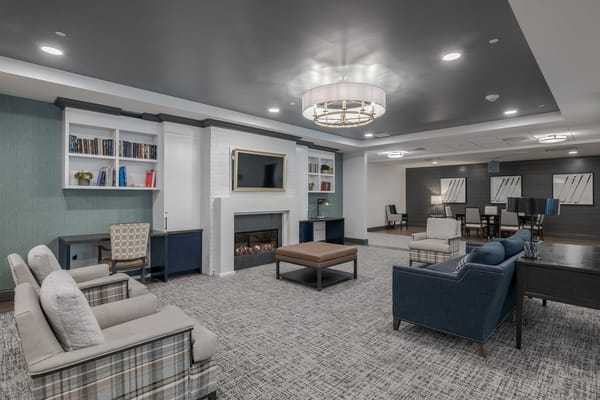 Cozy common area with seating and a fireplace