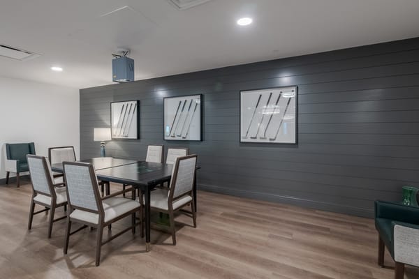 Interior common area with tables and chairs