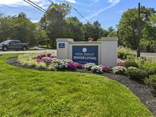 Exterior signage for Arbor Terrace Senior Living