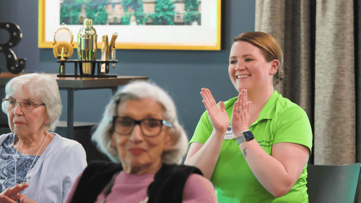 Residents and staff engaging in a fun activity