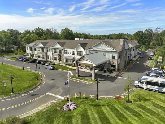 Exterior view of Arbor Terrace Basking Ridge with landscaped grounds