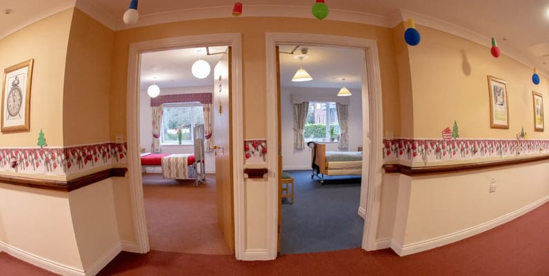 Interior hallway with resident rooms visible