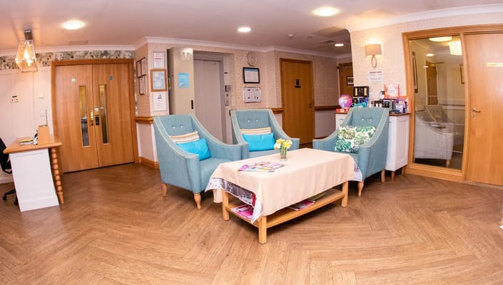 Comfortable seating area in a senior care home lobby