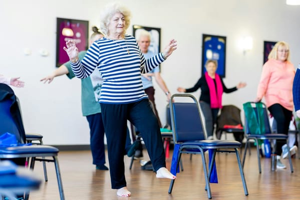 Residents participating in an activity class indoors