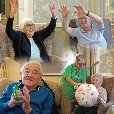 Residents enjoying an activity together in the lounge