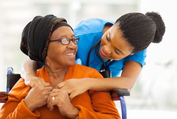 A caregiver interacting with a senior resident