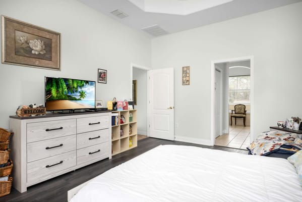 A well-furnished private resident room with decor