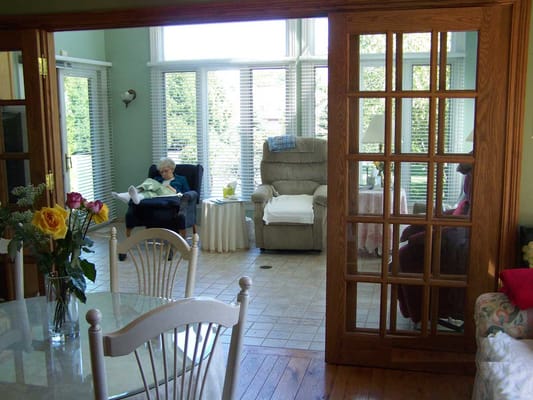 Residents relaxing in a bright common area