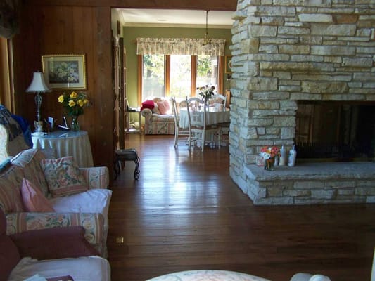 Cozy common area with sofas and a fireplace