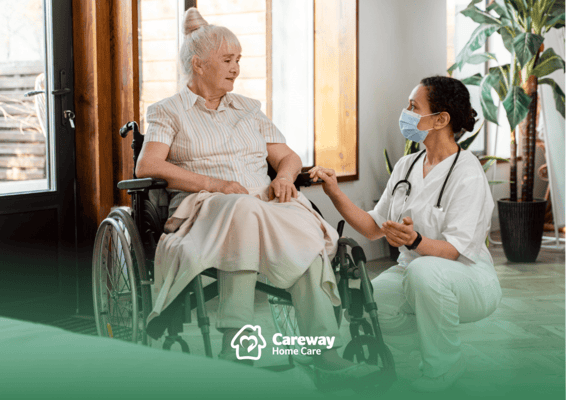 A caregiver attending to a resident in a cozy interior