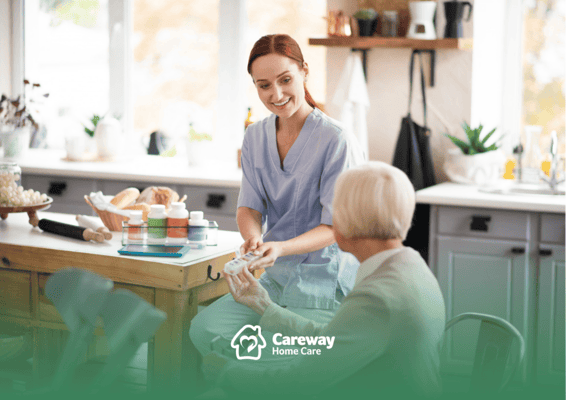 Caregiver assisting a senior resident in a kitchen