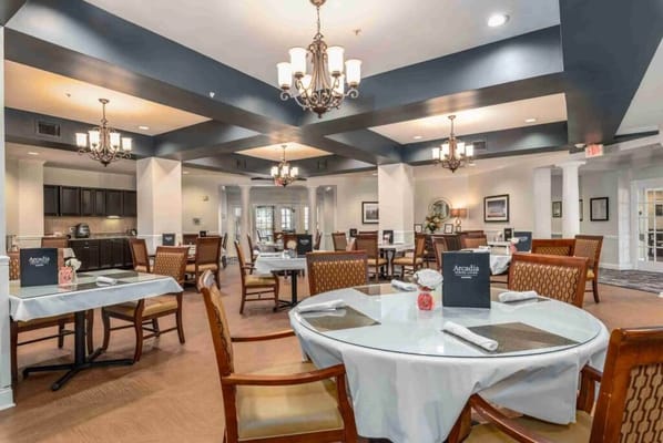 Bright dining room with tables and chairs