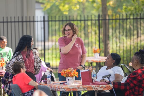 Residents engaged in an outdoor activity session