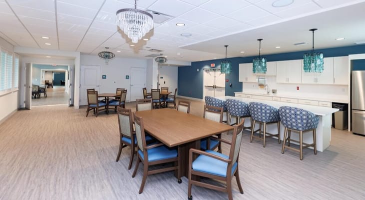 Bright and modern common area with dining table