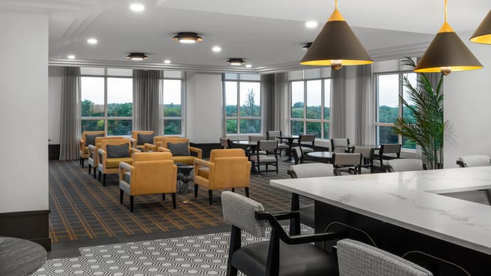 Common area with seating and large windows