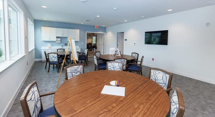 Bright common area with tables and chairs