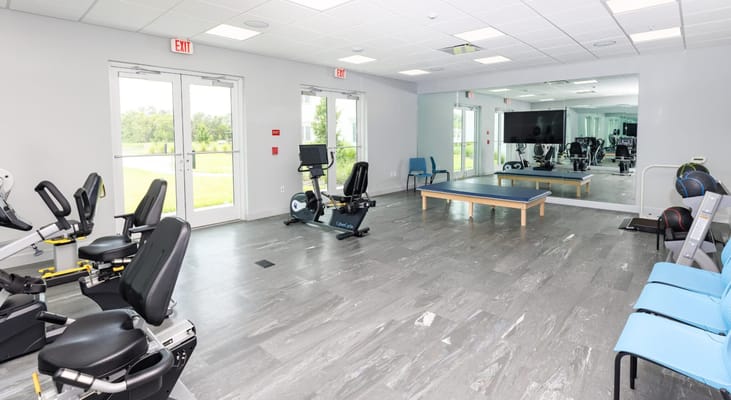 Interior view of a fitness area with exercise equipment
