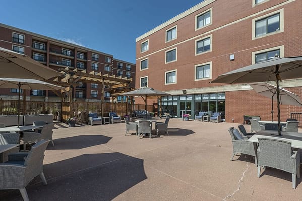 Outdoor seating area with umbrellas and tables